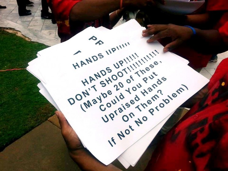 moral monday rally 9-22-2014_hands-up